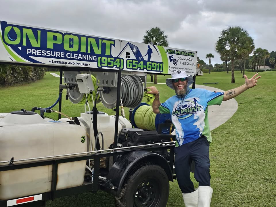 Mike Lucchesi, owner of On Point Pressure Cleaning, with the company truck and trailer